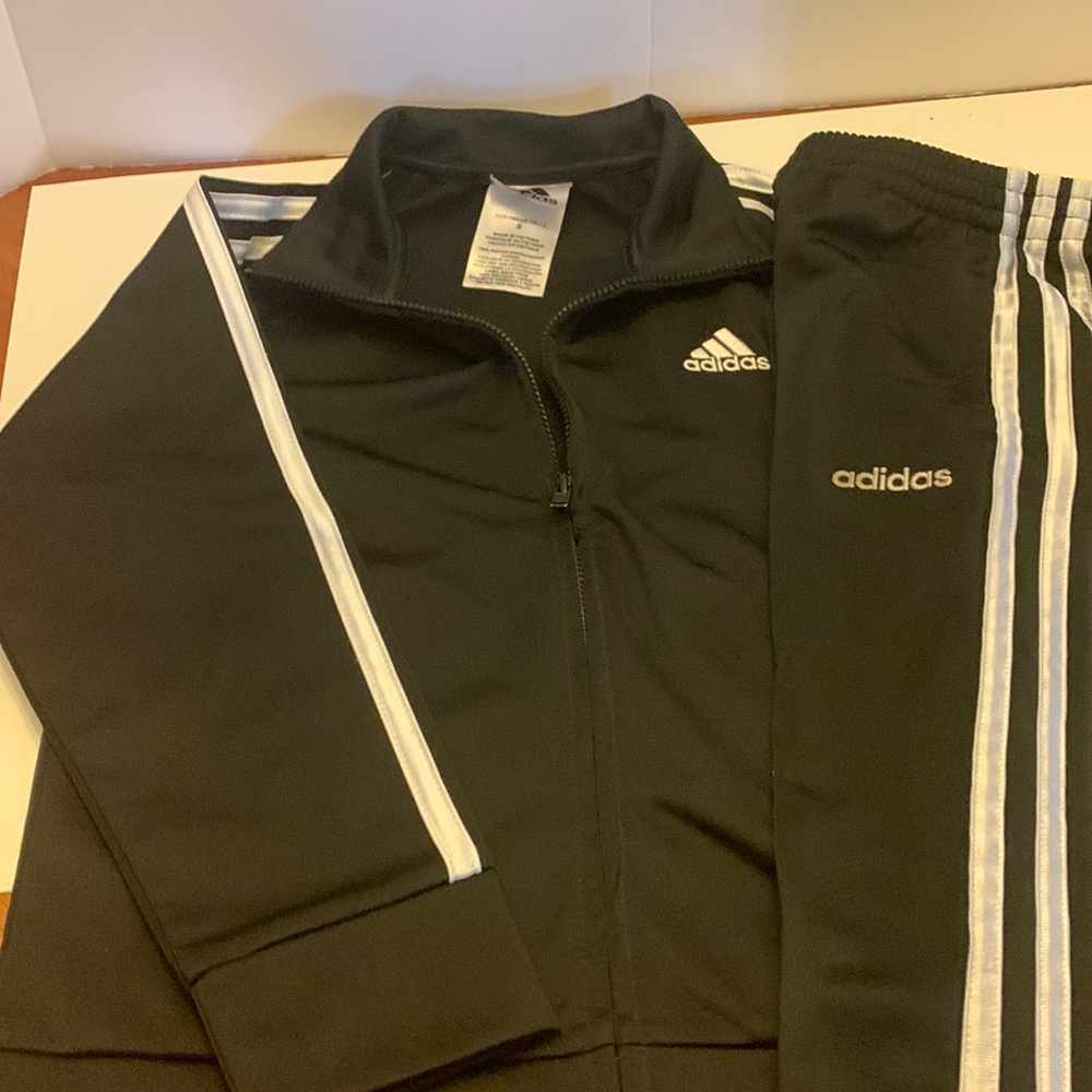 Adidas black tracksuit jacket jogger pant set size 5. In good condition.